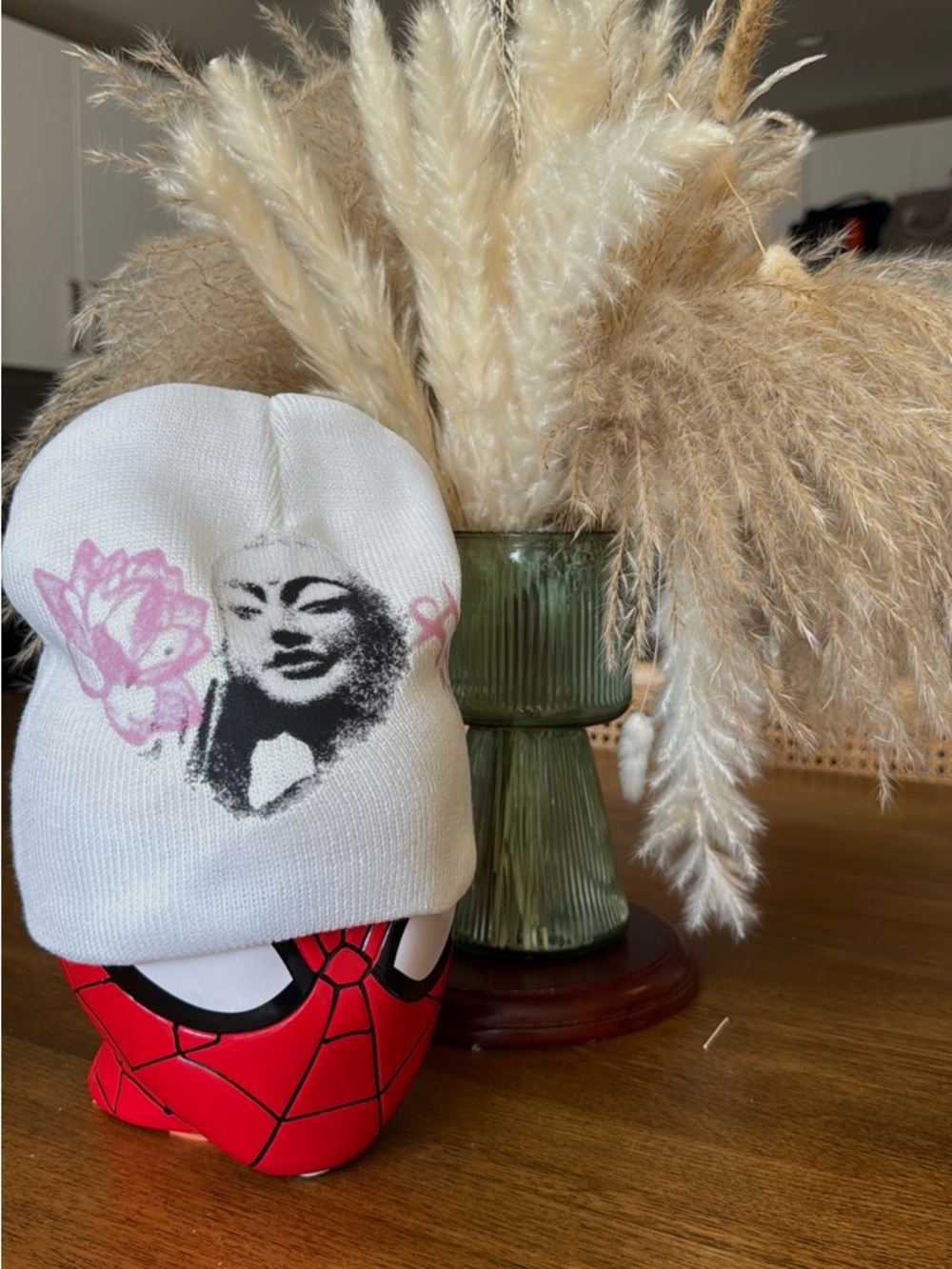 White Beanie with Black Face Print and Pink Floral Accent